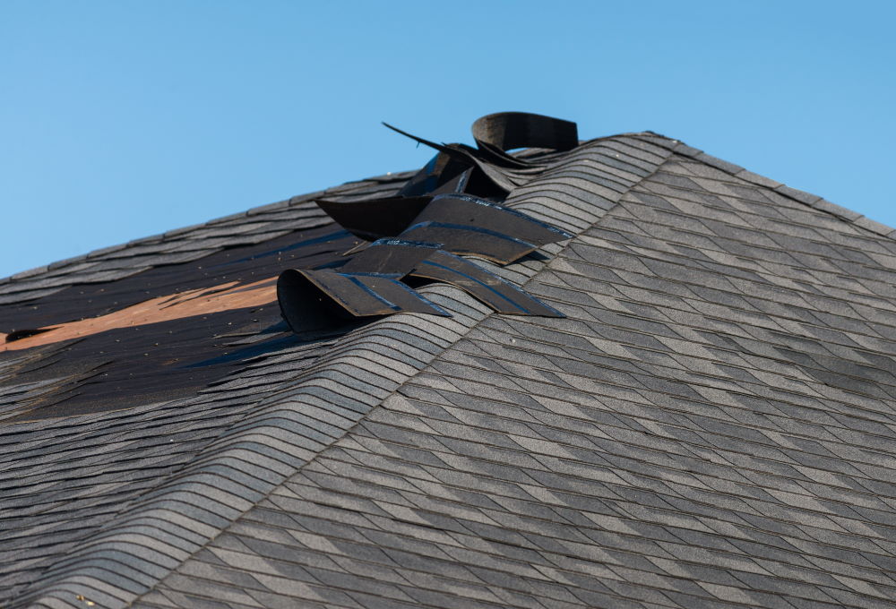 Wind Damage Repairs by Custom Roofing Solutions LLC