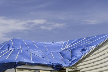 Roof Tarping in Lacoochee, Florida by Custom Roofing Solutions LLC
